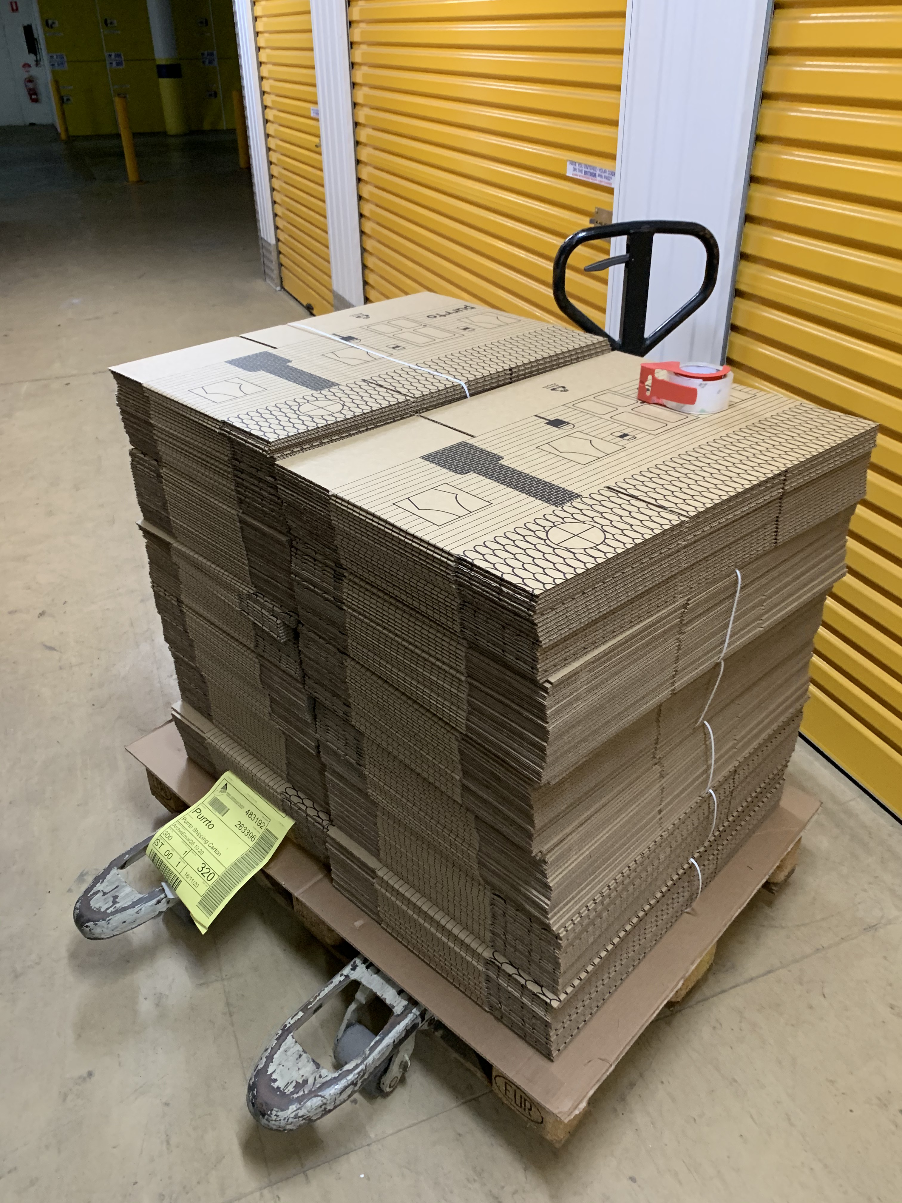 Stacks of cut cardboard scratcher pieces